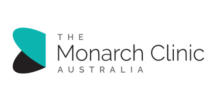 Logo of The Monarch Clinic Australia with a teal and dark gray abstract shape next to the clinic's name in gray.